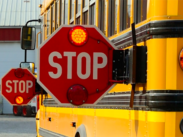 Failing to stop for a school bus has the risk of getting a traffic ticket, fine, and 4 demerit points on your license.